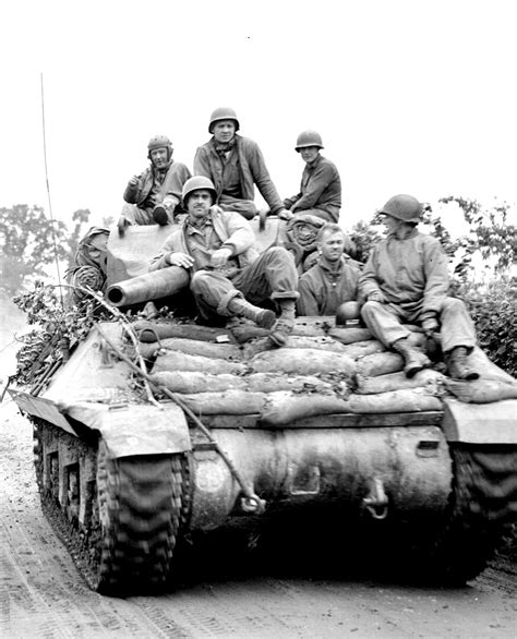 Men on Tank